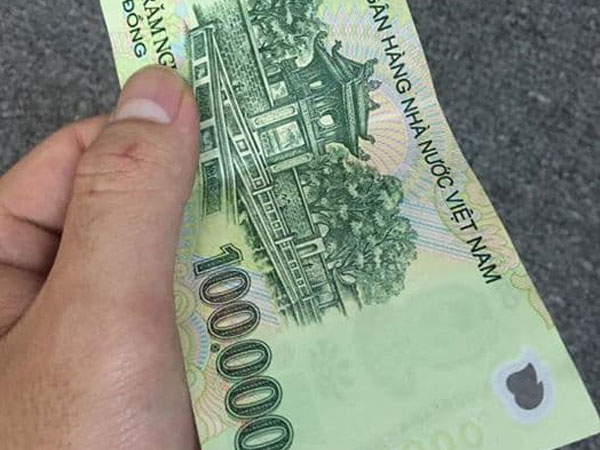 Ngủ mộng thấy người khác nhặt được tiền 100 nghìn